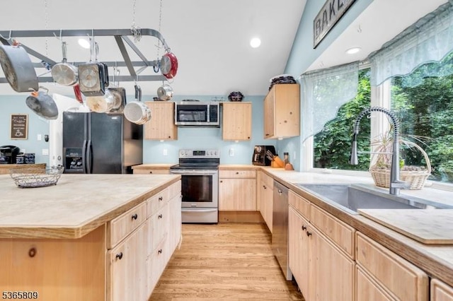 9 Mueller Ln, Franklin Twp, NJ 07882 - kitchen featuring stainless steel appliances, light brown cabinetry, light countertops, and light wood-style flooring