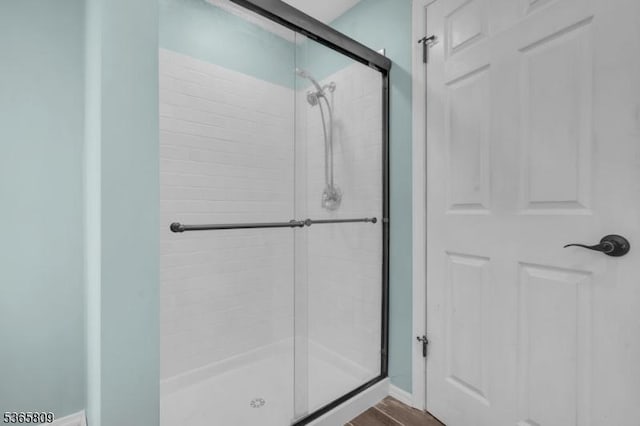 9 Mueller Ln, Franklin Twp, NJ 07882 - bathroom featuring a shower stall and wood finished floors