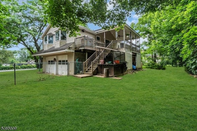 9 Mueller Ln, Franklin Twp, NJ 07882 - rear view of property featuring stairs, a wooden deck, and an attached garage
