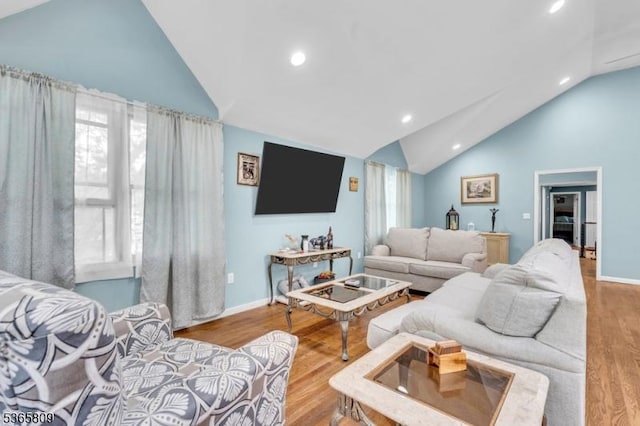 9 Mueller Ln, Franklin Twp, NJ 07882 - living room with recessed lighting, wood finished floors, healthy amount of natural light, and high vaulted ceiling