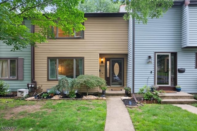 605 E Brookside Ln, Hillsborough Twp, NJ 08844 - townhome / multi-family property with a front yard