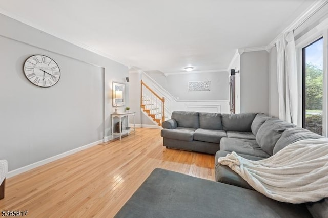 605 E Brookside Ln, Hillsborough Twp, NJ 08844 - living area featuring crown molding, stairs, and light wood-style floors