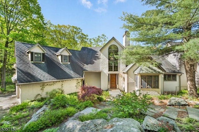 134 Milton Rd, Sparta Twp, NJ 07871 - view of front of home with a chimney and stucco siding