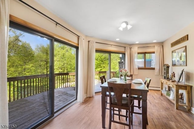 134 Milton Rd, Sparta Twp, NJ 07871 - dining space with wood finished floors, a baseboard heating unit, and recessed lighting