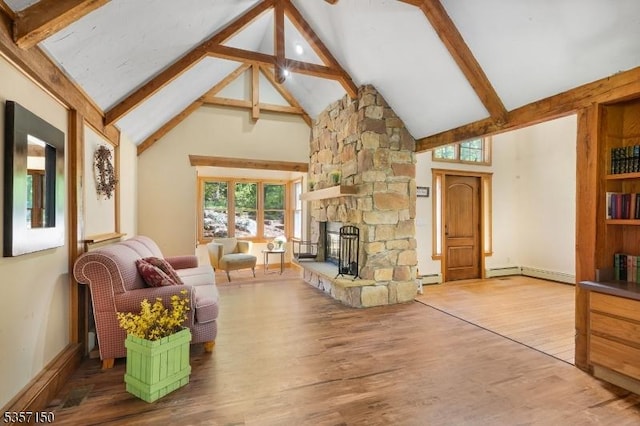 134 Milton Rd, Sparta Twp, NJ 07871 - living room featuring high vaulted ceiling, beamed ceiling, wood finished floors, a stone fireplace, and baseboard heating
