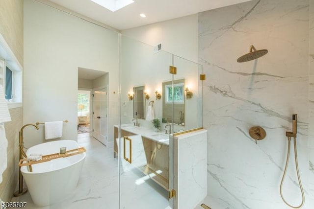 157 Meyersville Rd, Chatham Twp, NJ 07928 - full bath with a marble finish shower, a freestanding bath, marble tiled flooring, vanity, and a skylight