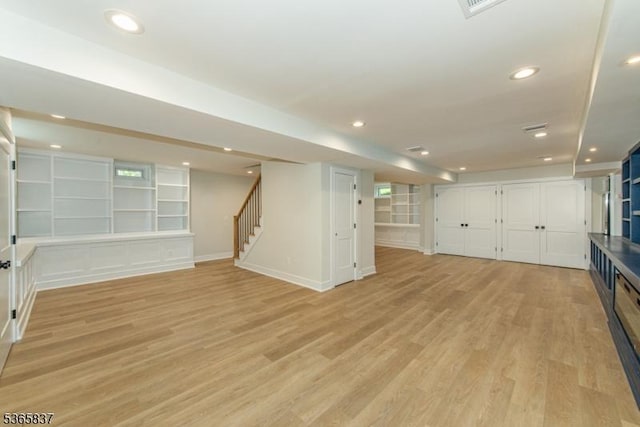 157 Meyersville Rd, Chatham Twp, NJ 07928 - unfurnished living room featuring stairs, light wood-style floors, recessed lighting, and built in shelves