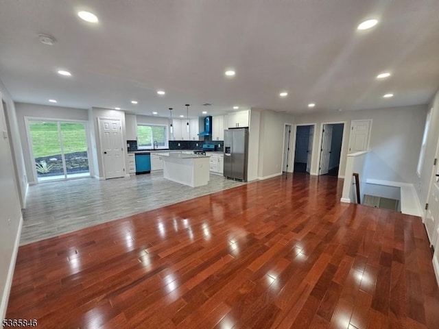 43 Rockport Rd, Wantage Twp, NJ 07461 - unfurnished living room featuring light wood-style flooring and recessed lighting
