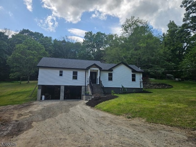 43 Rockport Rd, Wantage Twp, NJ 07461 - view of front of property featuring driveway, a garage, and a front lawn