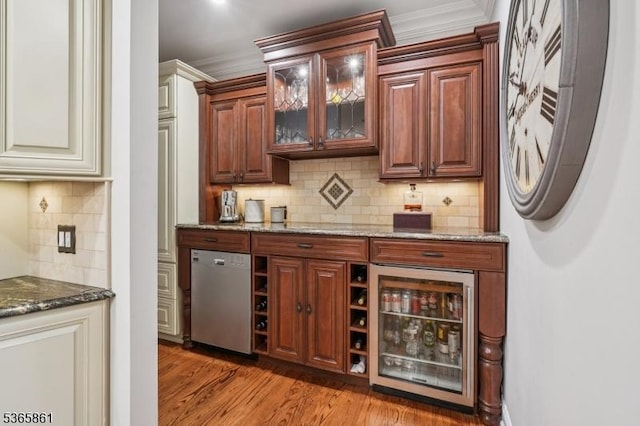 27 Wesley Ct, New Providence Boro, NJ 07974 - indoor dry bar with fridge, decorative backsplash, crown molding, light wood-style floors, and dishwasher