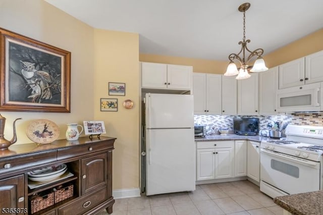 7108 Ravenscroft Rd Unit 7108, Clifton City, NJ 07013 - kitchen with white appliances, white cabinets, a chandelier, and decorative backsplash