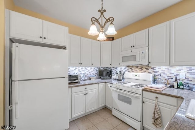 7108 Ravenscroft Rd Unit 7108, Clifton City, NJ 07013 - kitchen with white appliances, a chandelier, white cabinetry, and tasteful backsplash