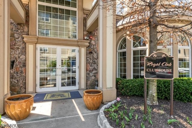 7108 Ravenscroft Rd Unit 7108, Clifton City, NJ 07013 - view of exterior entry with french doors and stone siding