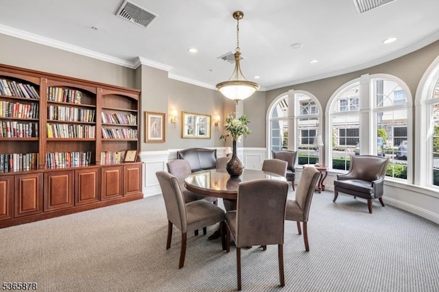 7108 Ravenscroft Rd Unit 7108, Clifton City, NJ 07013 - dining room with light carpet, plenty of natural light, a wainscoted wall, recessed lighting, and crown molding