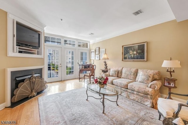 7108 Ravenscroft Rd Unit 7108, Clifton City, NJ 07013 - living room with wood finished floors, a fireplace, and french doors