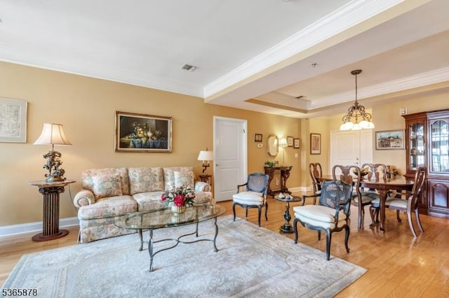 7108 Ravenscroft Rd Unit 7108, Clifton City, NJ 07013 - living area featuring light wood finished floors, crown molding, a chandelier, and a tray ceiling