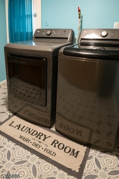 452 W 4th Ave, Roselle Boro, NJ 07203 - washroom featuring independent washer and dryer and tile patterned floors