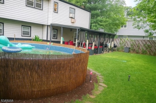 452 W 4th Ave, Roselle Boro, NJ 07203 - fenced backyard featuring a sunroom