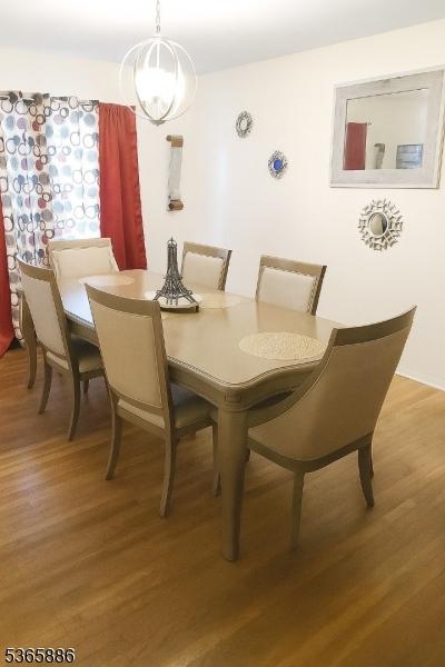 452 W 4th Ave, Roselle Boro, NJ 07203 - dining room featuring light wood-style flooring