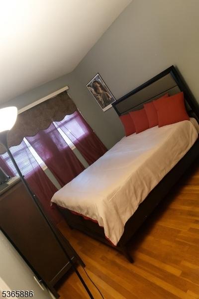 452 W 4th Ave, Roselle Boro, NJ 07203 - bedroom featuring wood finished floors