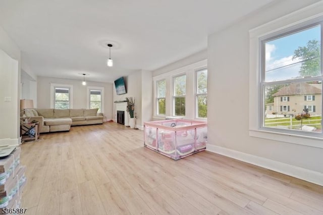 62 Rt46, Mine Hill Twp, NJ 07803 - living area with light wood-style flooring and a fireplace