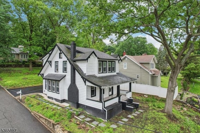 62 Rt46, Mine Hill Twp, NJ 07803 - view of home's exterior with a shingled roof, a chimney, and view of scattered trees