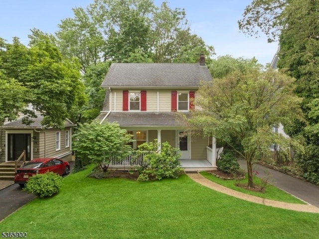 72 Meadowbrook Rd, Millburn Twp, NJ 07078 - view of front of property featuring a chimney, a front lawn, and a porch