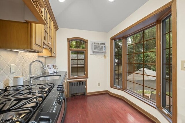 72 Meadowbrook Rd, Millburn Twp, NJ 07078 - kitchen featuring radiator heating unit, healthy amount of natural light, a wall mounted AC, gas range oven, and vaulted ceiling