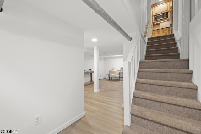 72 Meadowbrook Rd, Millburn Twp, NJ 07078 - staircase with wood finished floors and recessed lighting
