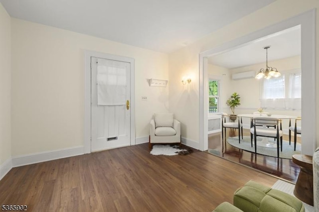 72 Meadowbrook Rd, Millburn Twp, NJ 07078 - living room featuring wood finished floors, a chandelier, and a wall mounted AC