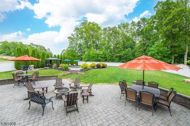 48 Saunders Ln, Mount Olive Twp, NJ 07840 - fenced backyard with outdoor dining area, an outdoor fire pit, and a patio area