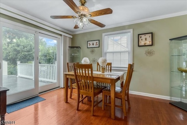 1592 Front St, Scotch Plains Twp, NJ 07076 - dining space featuring ornamental molding, wood finished floors, and a ceiling fan