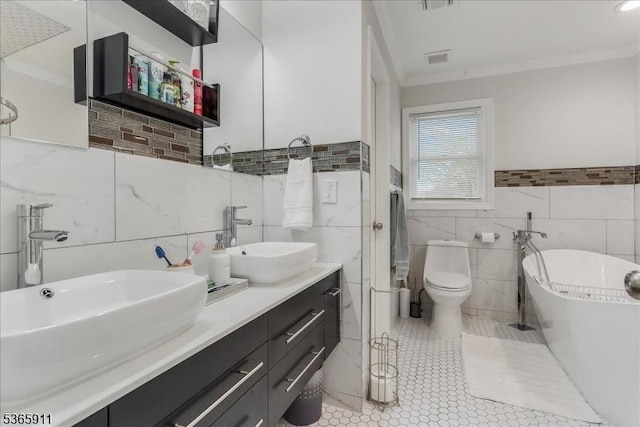 1592 Front St, Scotch Plains Twp, NJ 07076 - full bath featuring tile walls, a soaking tub, ornamental molding, double vanity, and tile patterned floors