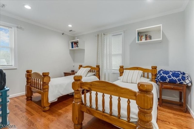 1592 Front St, Scotch Plains Twp, NJ 07076 - bedroom with ornamental molding, light wood-type flooring, and recessed lighting