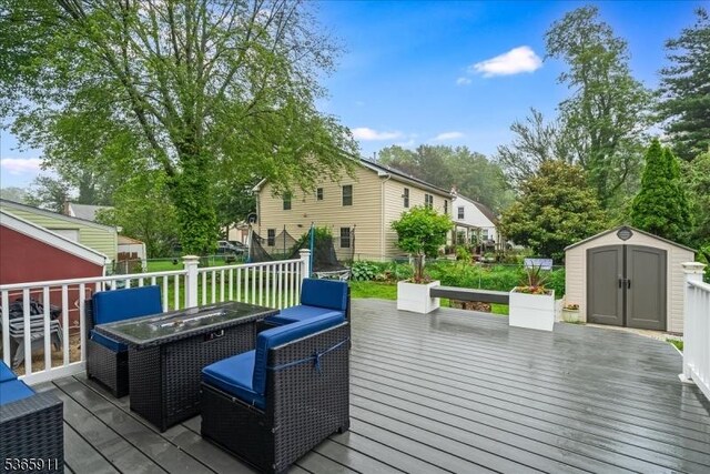 1592 Front St, Scotch Plains Twp, NJ 07076 - deck featuring a storage unit and outdoor dining space