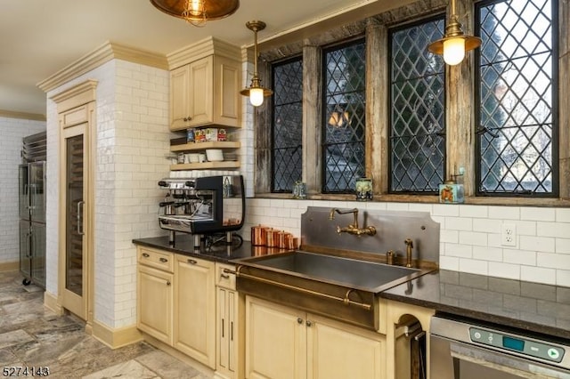 12 Canfield Rd, Morris Twp, NJ 07960 - kitchen with dark countertops, tasteful backsplash, cream cabinetry, and crown molding