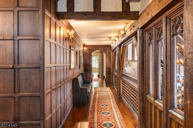 12 Canfield Rd, Morris Twp, NJ 07960 - hallway with arched walkways and dark wood finished floors