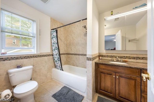29 E Price St Unit 4, Linden City, NJ 07036 - bathroom featuring tile walls, vanity, tile patterned floors, shower / bath combination with curtain, and a wainscoted wall