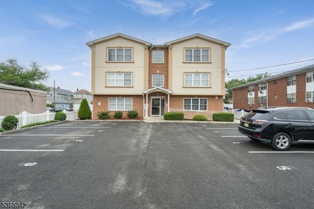 29 E Price St Unit 4, Linden City, NJ 07036 - townhome / multi-family property featuring uncovered parking, brick siding, and stucco siding
