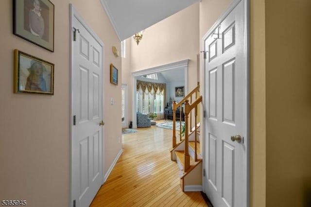 51 Bertran Dr, Bridgewater Twp, NJ 08807 - foyer entrance with light wood-style floors, stairway, and a chandelier