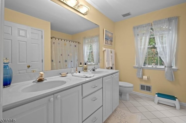 51 Bertran Dr, Bridgewater Twp, NJ 08807 - bathroom with double vanity, tile patterned floors, and a shower with curtain