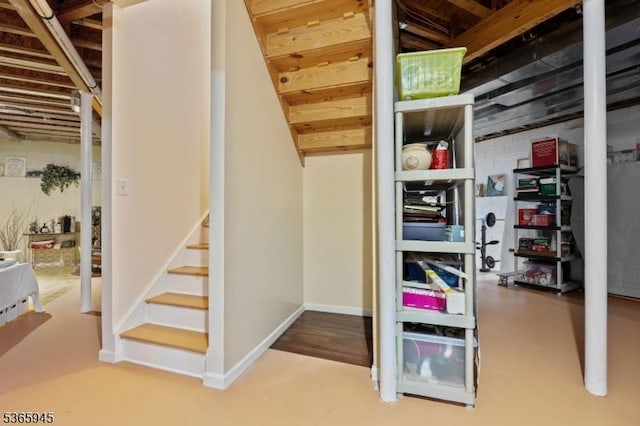 51 Bertran Dr, Bridgewater Twp, NJ 08807 - basement featuring stairway and baseboards