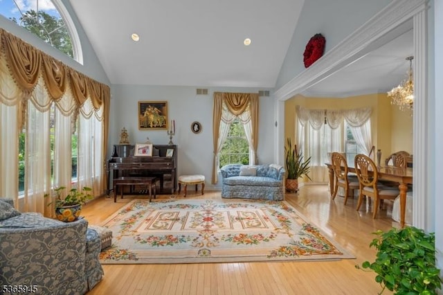 51 Bertran Dr, Bridgewater Twp, NJ 08807 - living area with high vaulted ceiling, a chandelier, wood finished floors, and recessed lighting