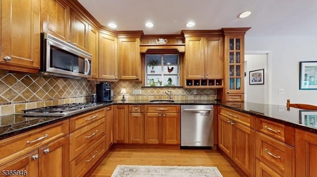 10 Walnut Grove Rd, Hillsborough Twp, NJ 08844 - kitchen featuring stainless steel appliances, light wood finished floors, dark stone counters, and recessed lighting