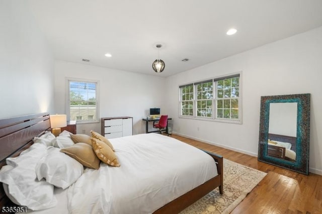 87-02 Centre St Unit 2, Nutley Twp, NJ 07110 - bedroom with wood finished floors and recessed lighting