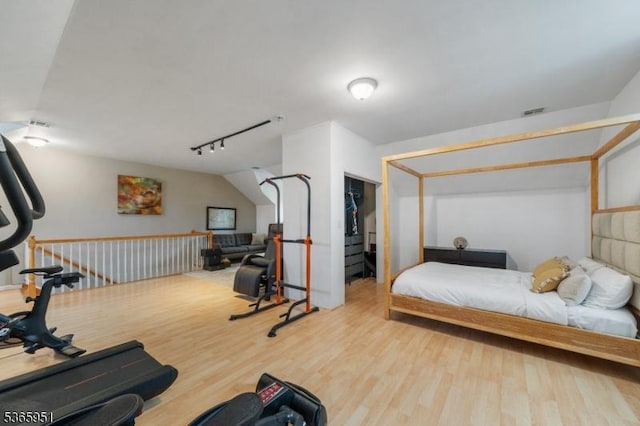 87-02 Centre St Unit 2, Nutley Twp, NJ 07110 - bedroom featuring wood finished floors and rail lighting