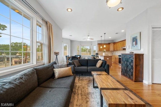 87-02 Centre St Unit 2, Nutley Twp, NJ 07110 - living area with light wood-style floors, recessed lighting, and ceiling fan