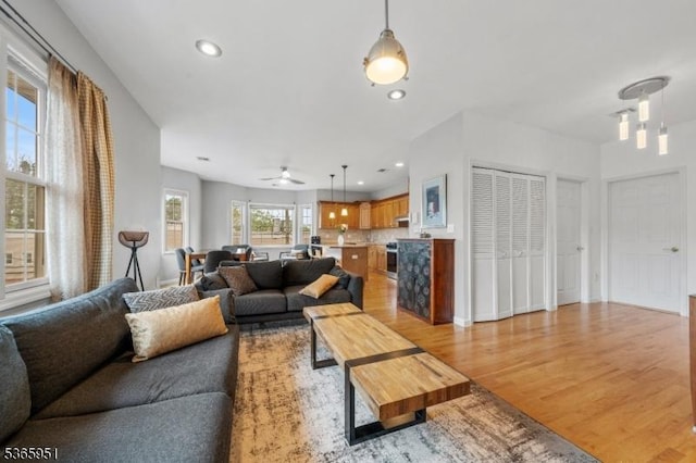 87-02 Centre St Unit 2, Nutley Twp, NJ 07110 - living area featuring light wood-type flooring, a ceiling fan, and recessed lighting