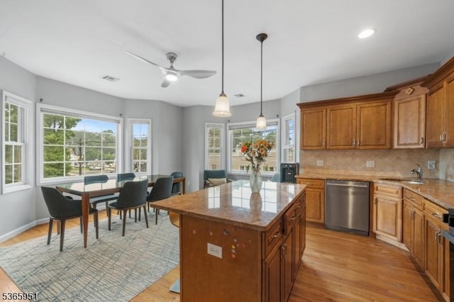 87-02 Centre St Unit 2, Nutley Twp, NJ 07110 - kitchen featuring stainless steel dishwasher, healthy amount of natural light, light wood-style flooring, ceiling fan, and recessed lighting