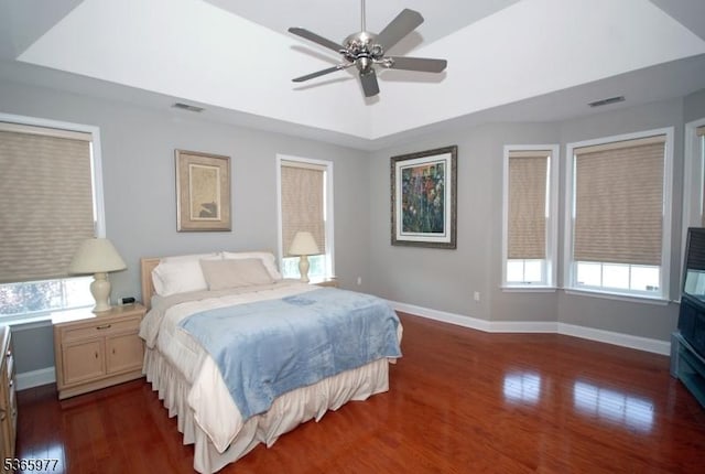 10 Cliff Rd Unit A3, Woodland Park, NJ 07424 - bedroom with dark wood-style flooring, a raised ceiling, and a ceiling fan